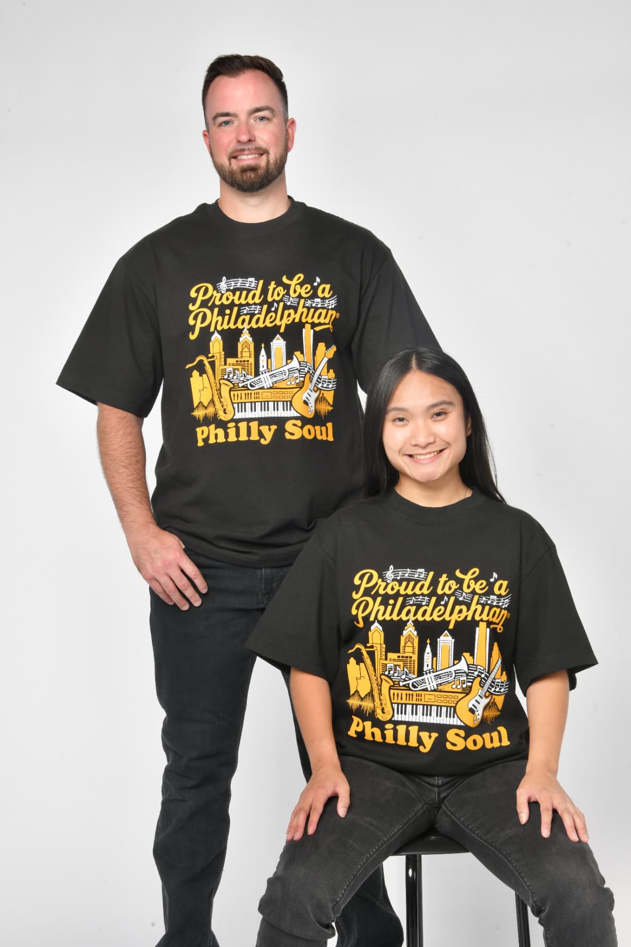 Models wearing the Philly Soul tee
