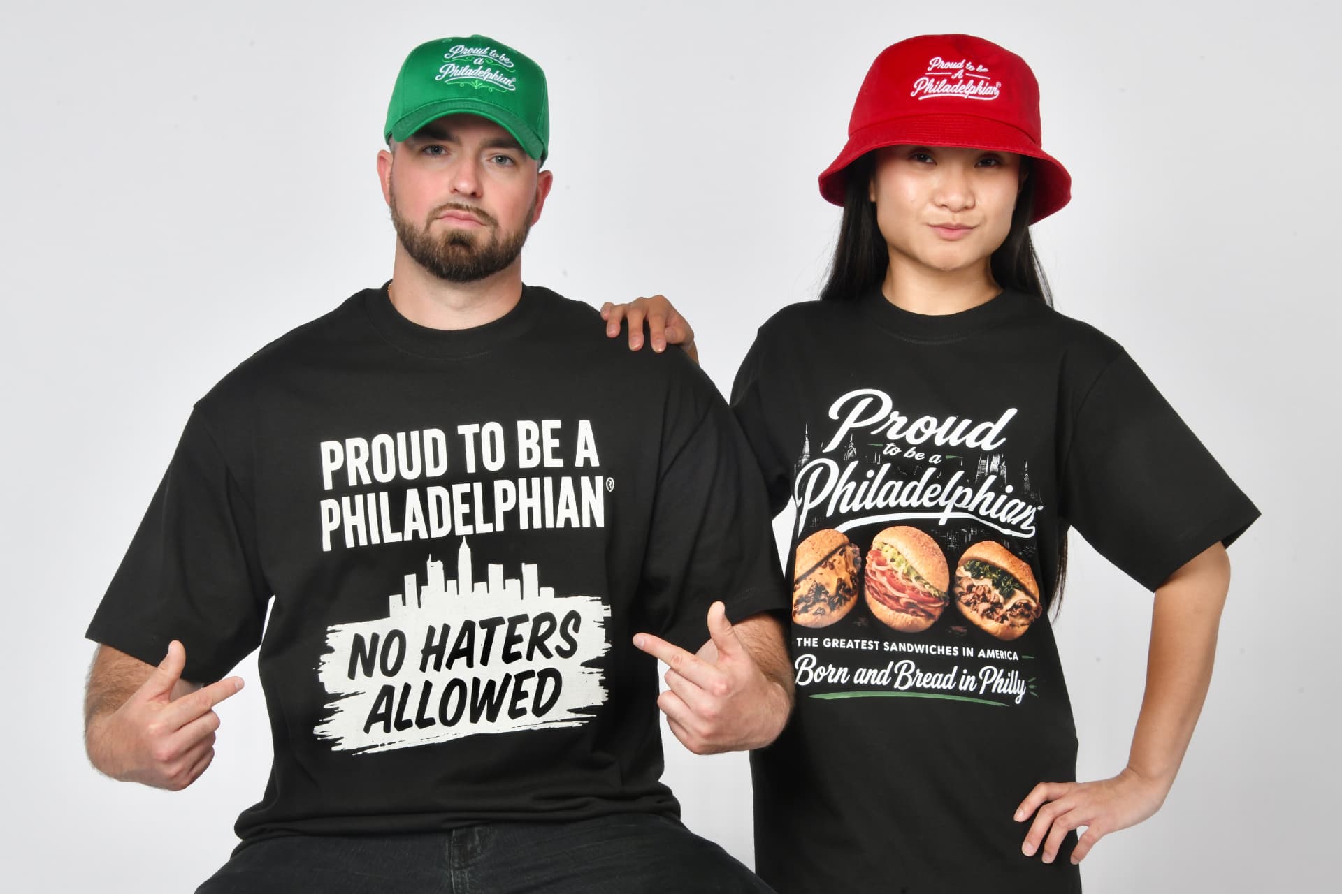 Model wearing the No Haters Allowed tee with a green hat
